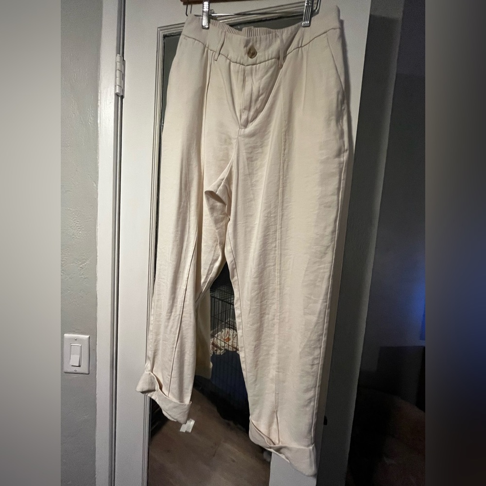 Cream colored trousers
